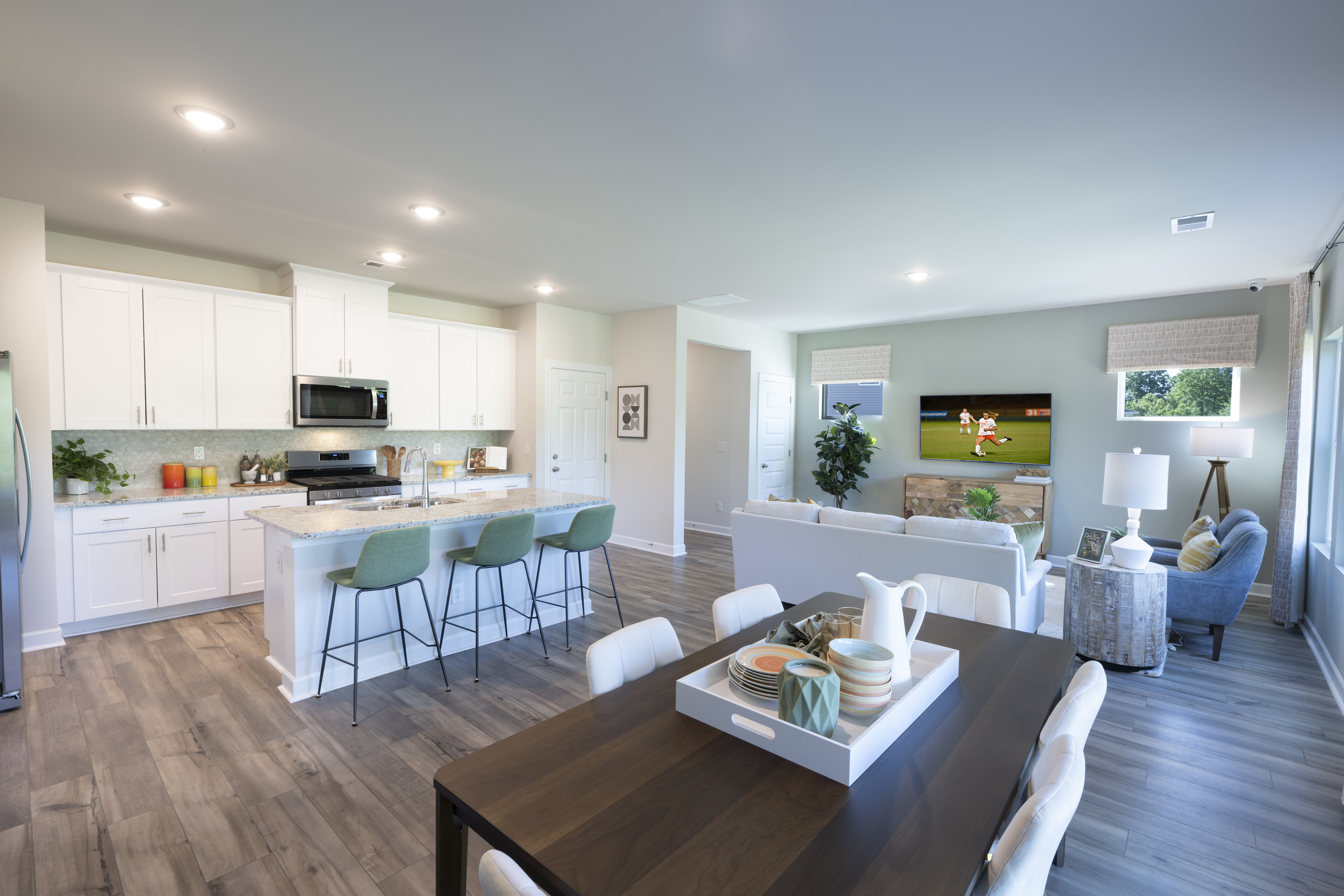 The Lennon floorplan modeled at Village at White Pine.