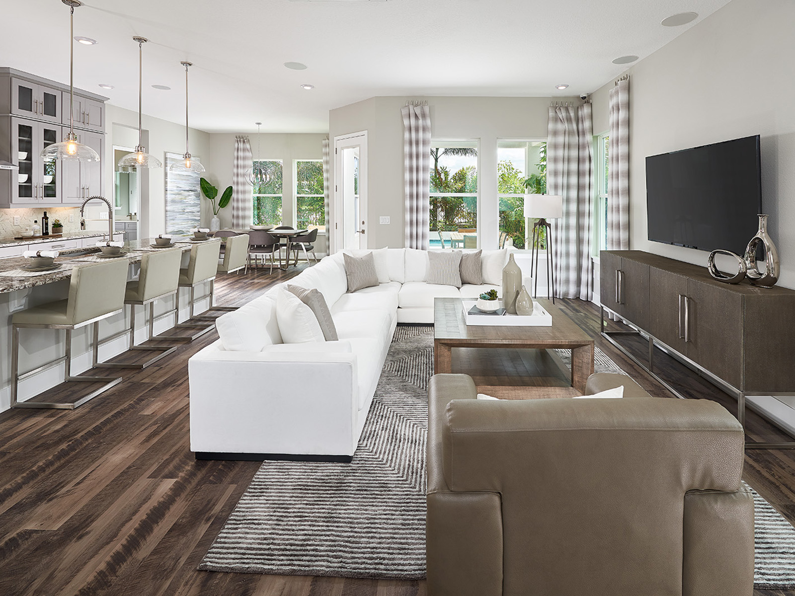 This beautifully designed gourmet kitchen is a chef's dream with built-in stainless steel appliances and tons of counter space.