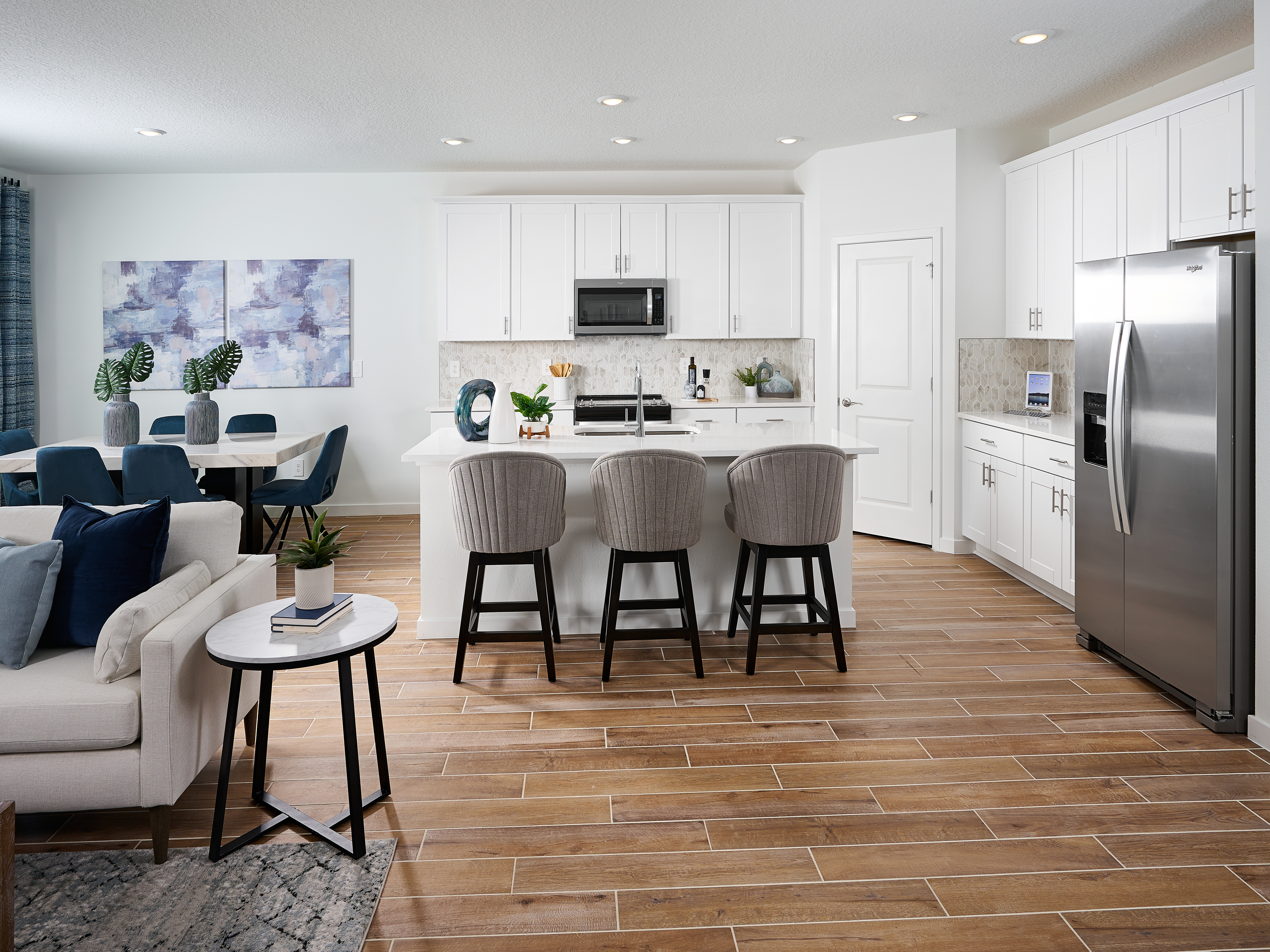 Great room of the Orchid Plan modeled at Colbert Landings.