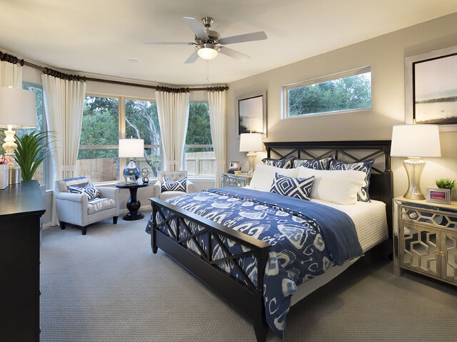 Bedroom with blue carpet