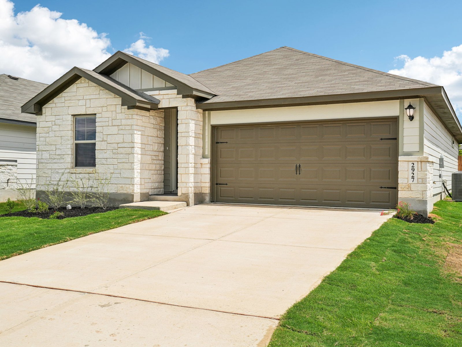 Front exterior of the Briscoe floorplan at a Meritage Homes community.