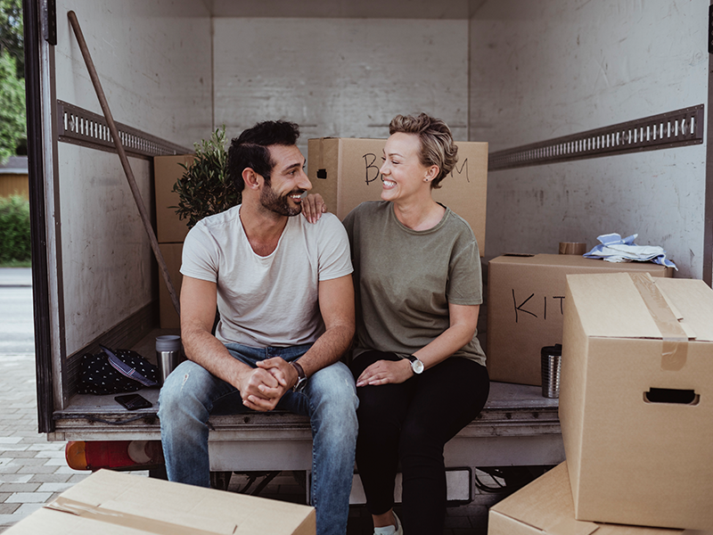 Man and woman in moving truck