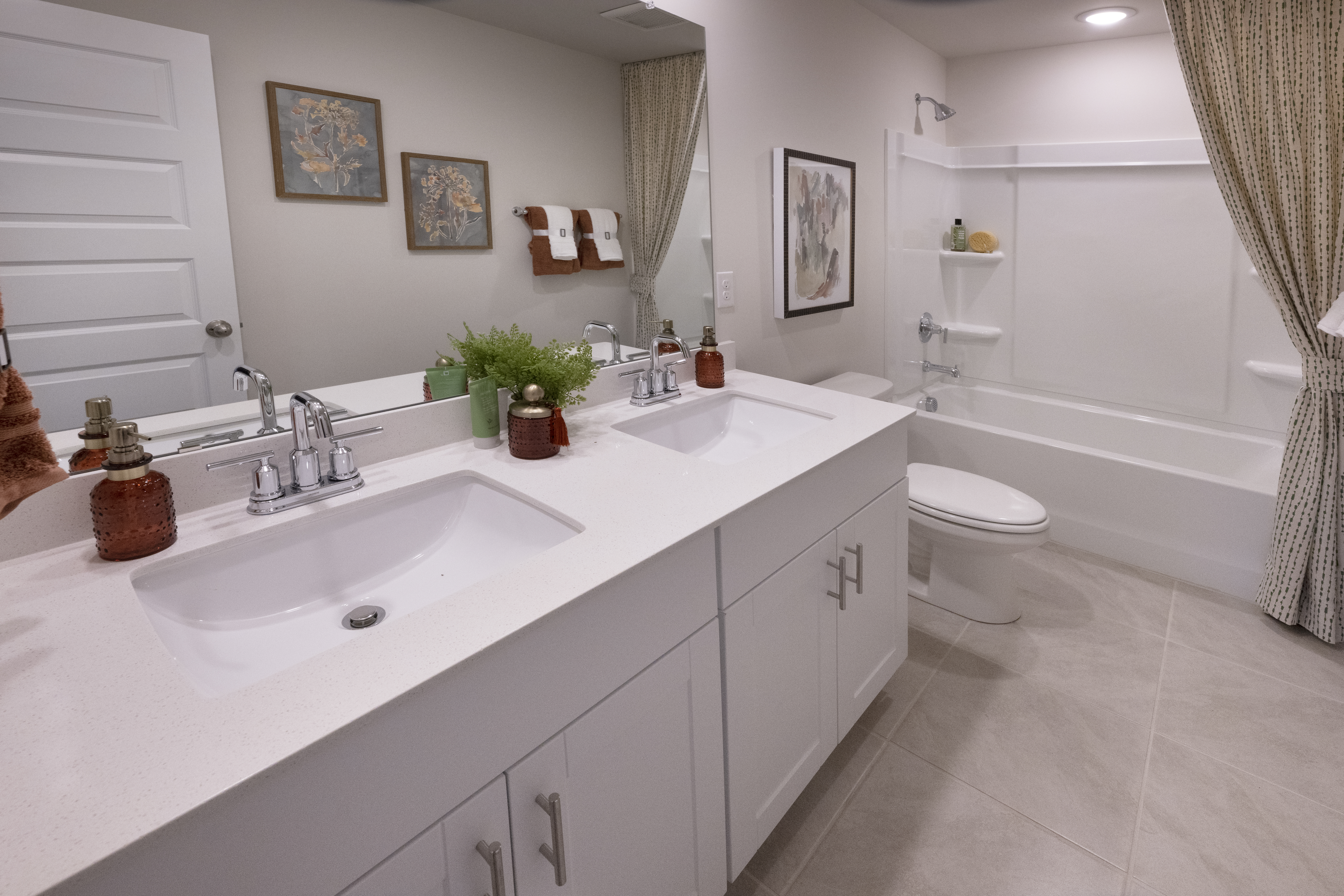 The Lennon floorplan modeled at Village at White Pine.