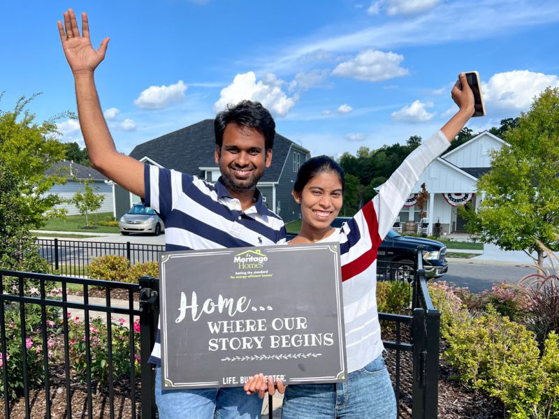 Customers in front of their Meritage home.