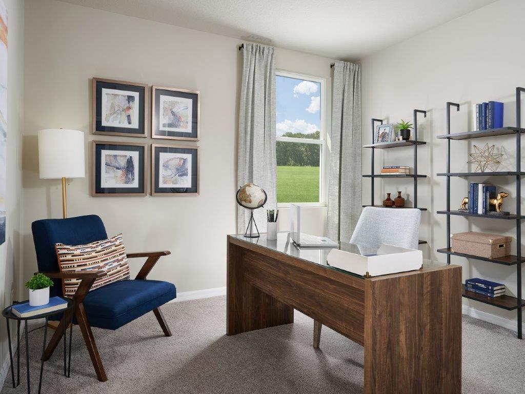 Kitchen in the Hibiscus floorplan modeled at The Reserve at Twin Lakes