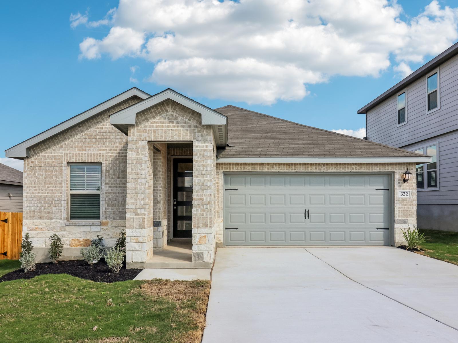 Front exterior of the Briscoe floorplan at a Meritage Homes community.