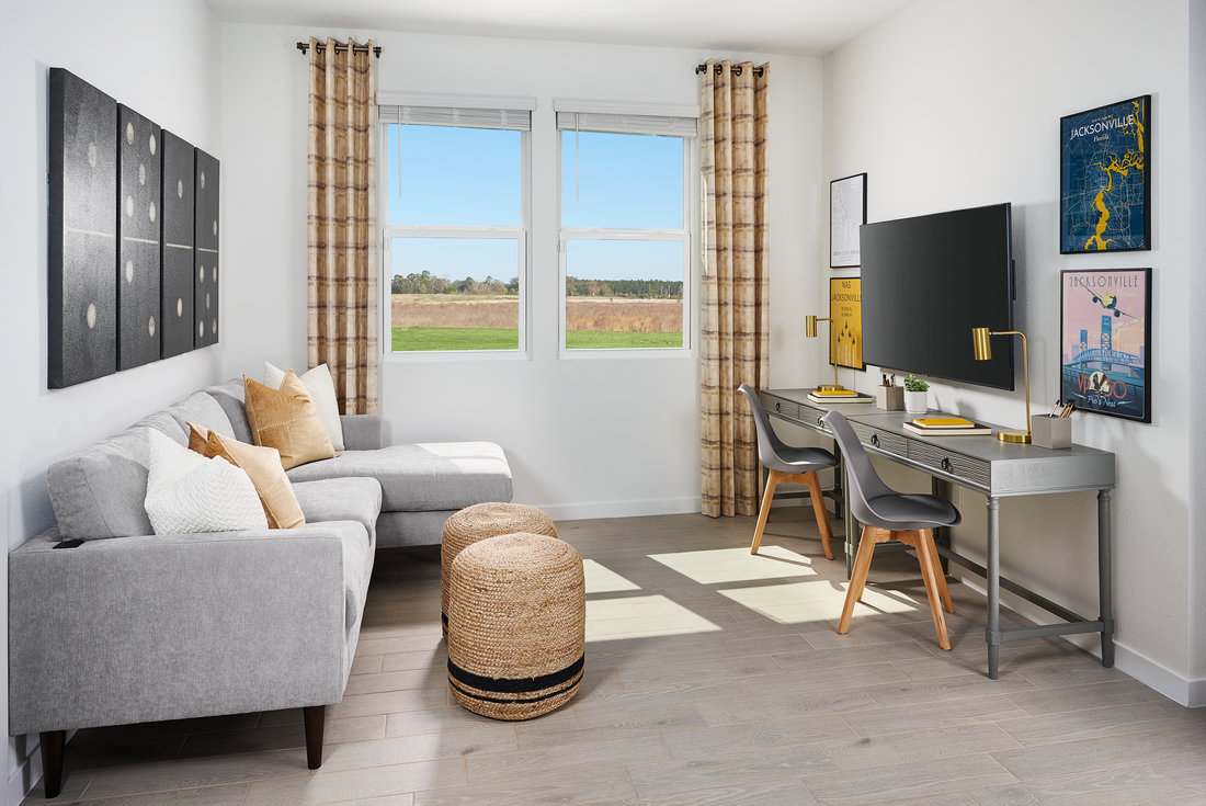 Great room of the Orchid Plan modeled at Colbert Landings.