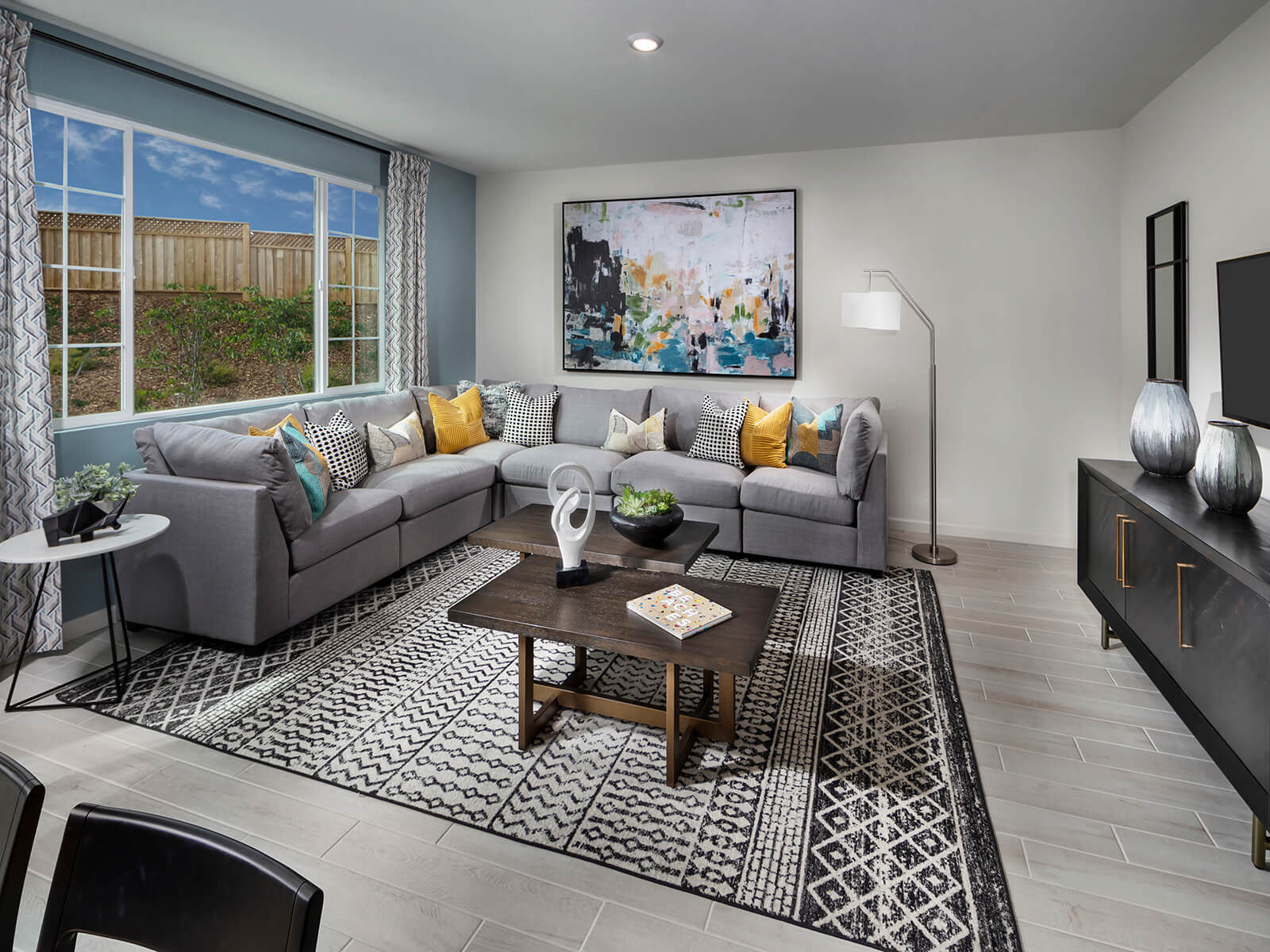 Residence 1 great room modeled at a nearby Meritage community.