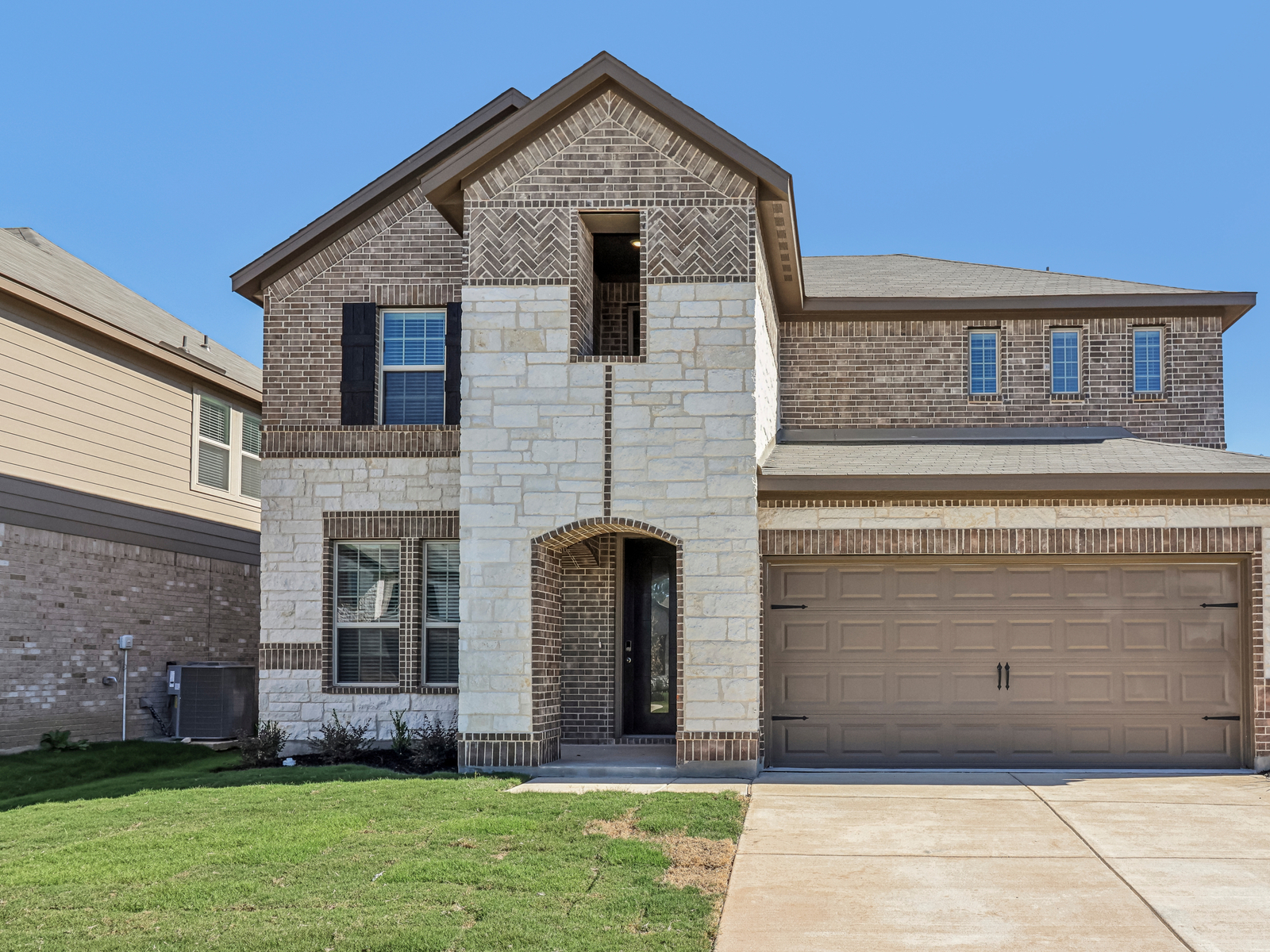 Front exterior of the Evergreen floorplan at a Meritage Homes community.