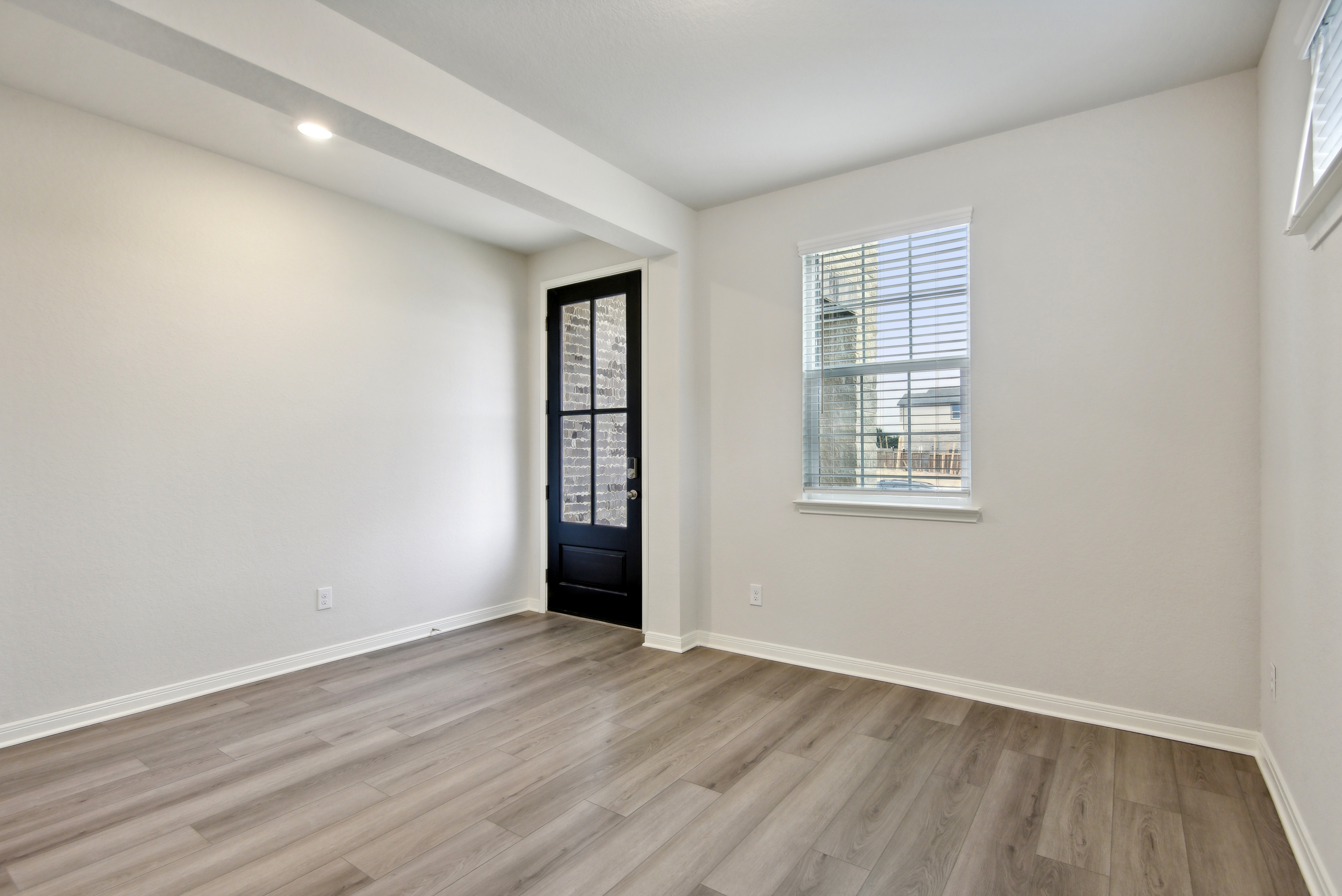 Front exterior of the Red River floorplan at a Meritage Homes community.