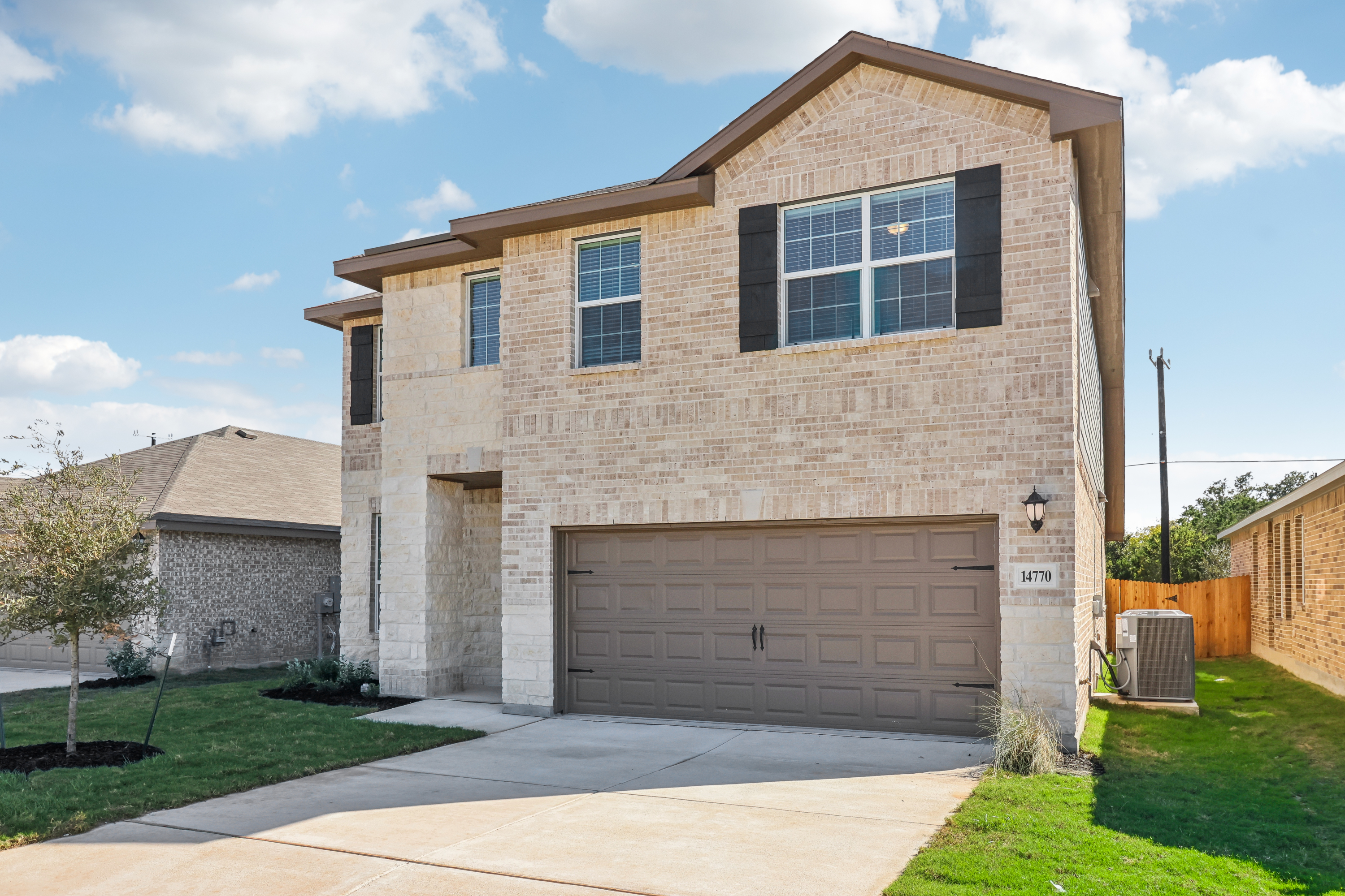 Front exterior of the Sabine floorplan at a Meritage Homes community.