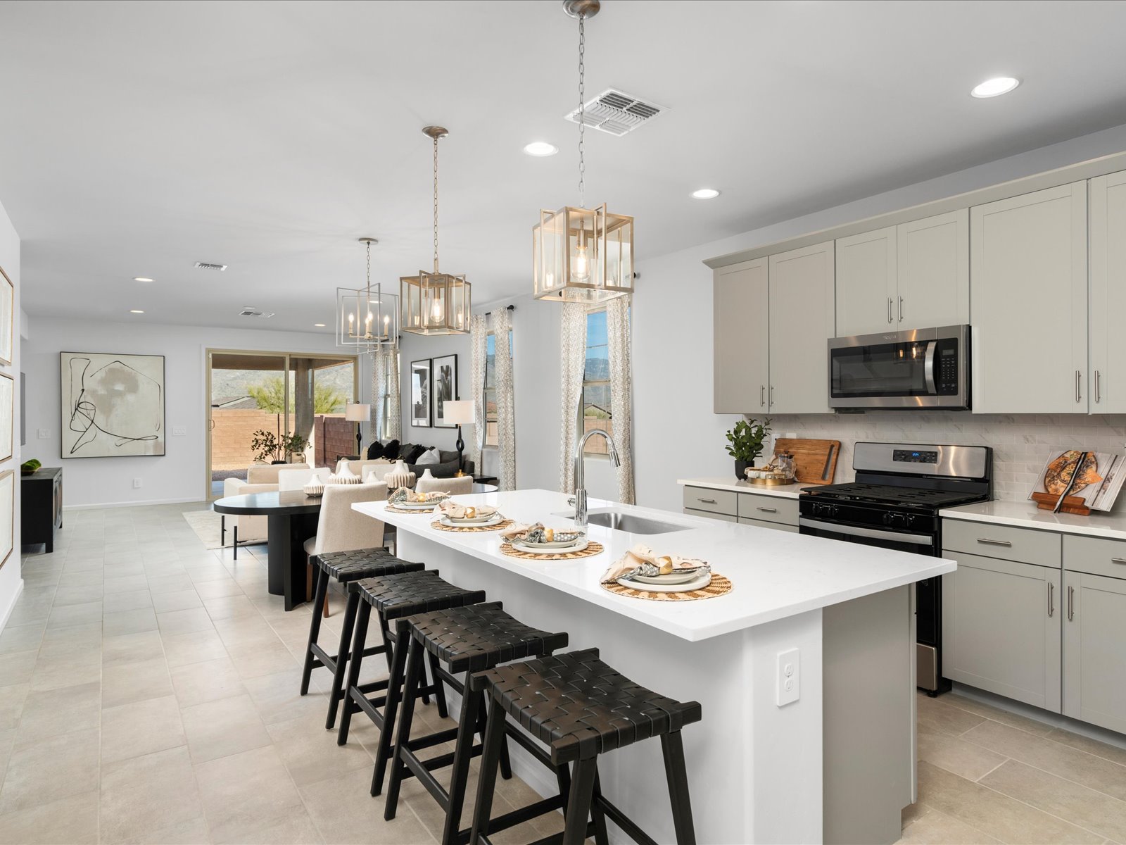 Enjoy an open concept kitchen complete with a suite of Whirlpool® appliances.