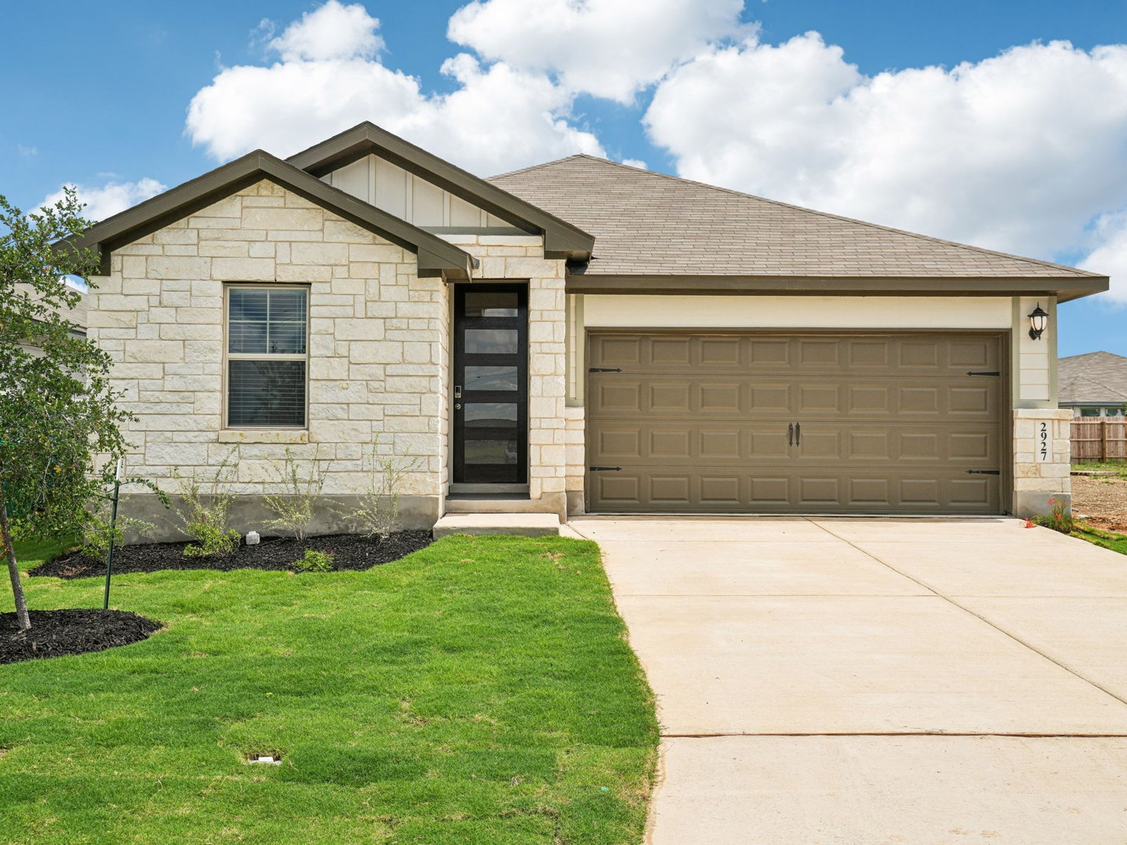 Front exterior of the Briscoe floorplan at a Meritage Homes community.