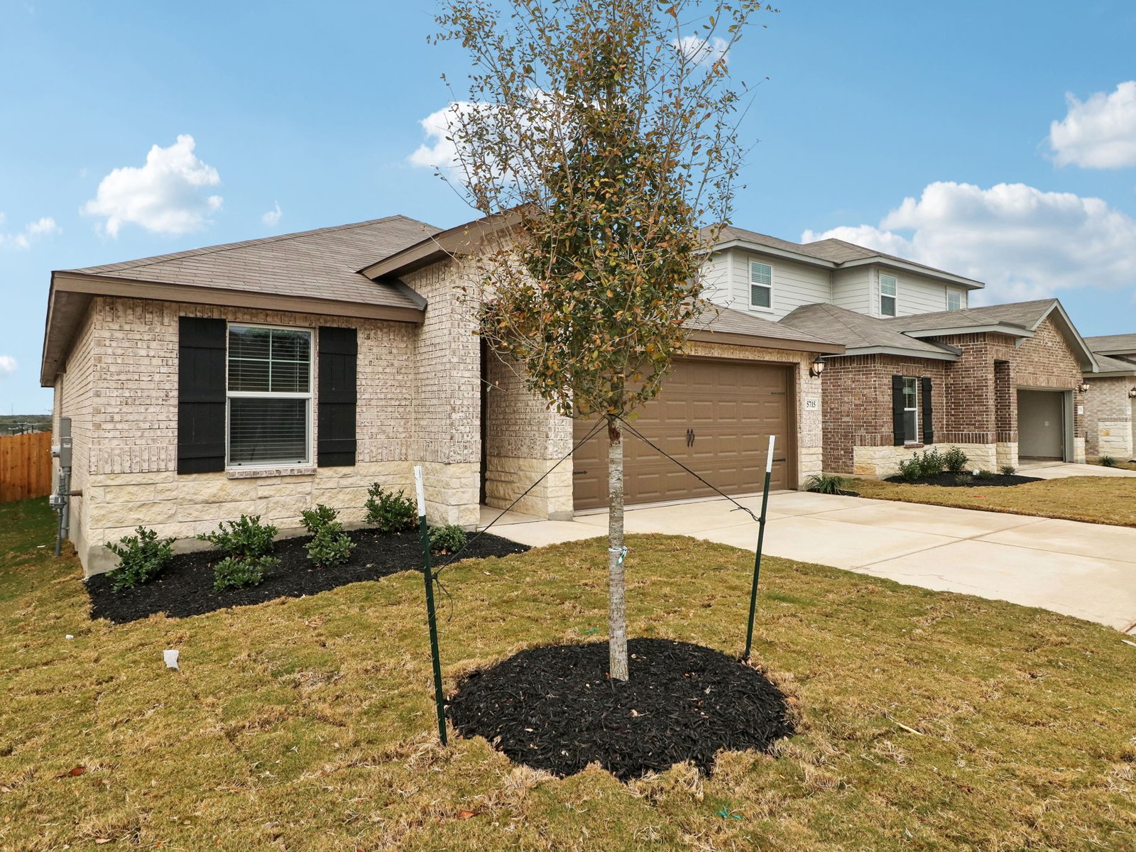 Front exterior of the Allen floorplan at a Meritage Homes community.