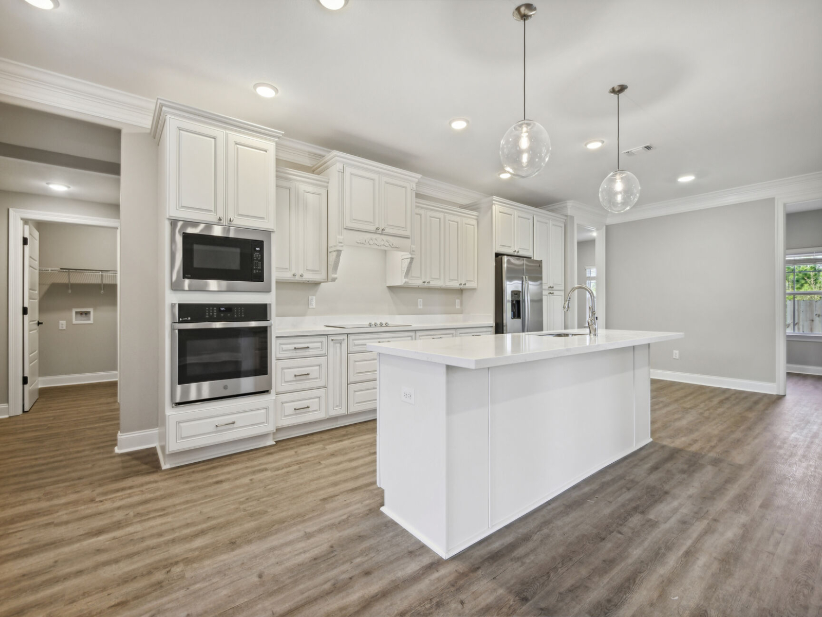 Kitchen in the Elliott floorplan at a Meritage Homes community in Gulfport, MS.