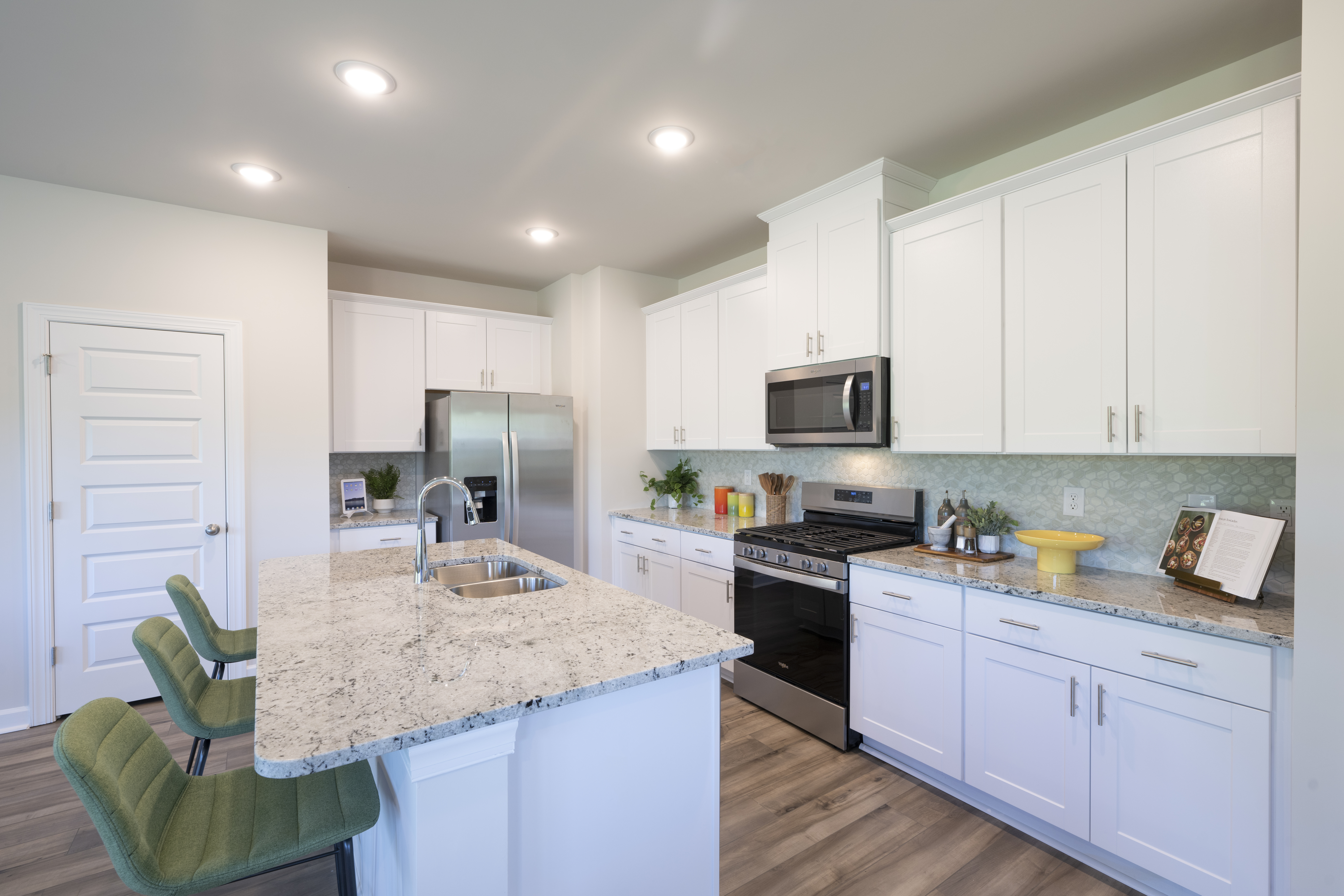 The Lennon floorplan modeled at Village at White Pine.