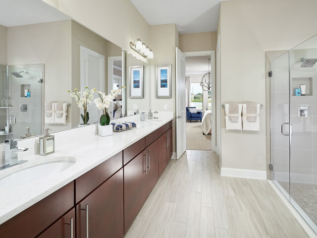 Bathroom with light wooden floors and shower