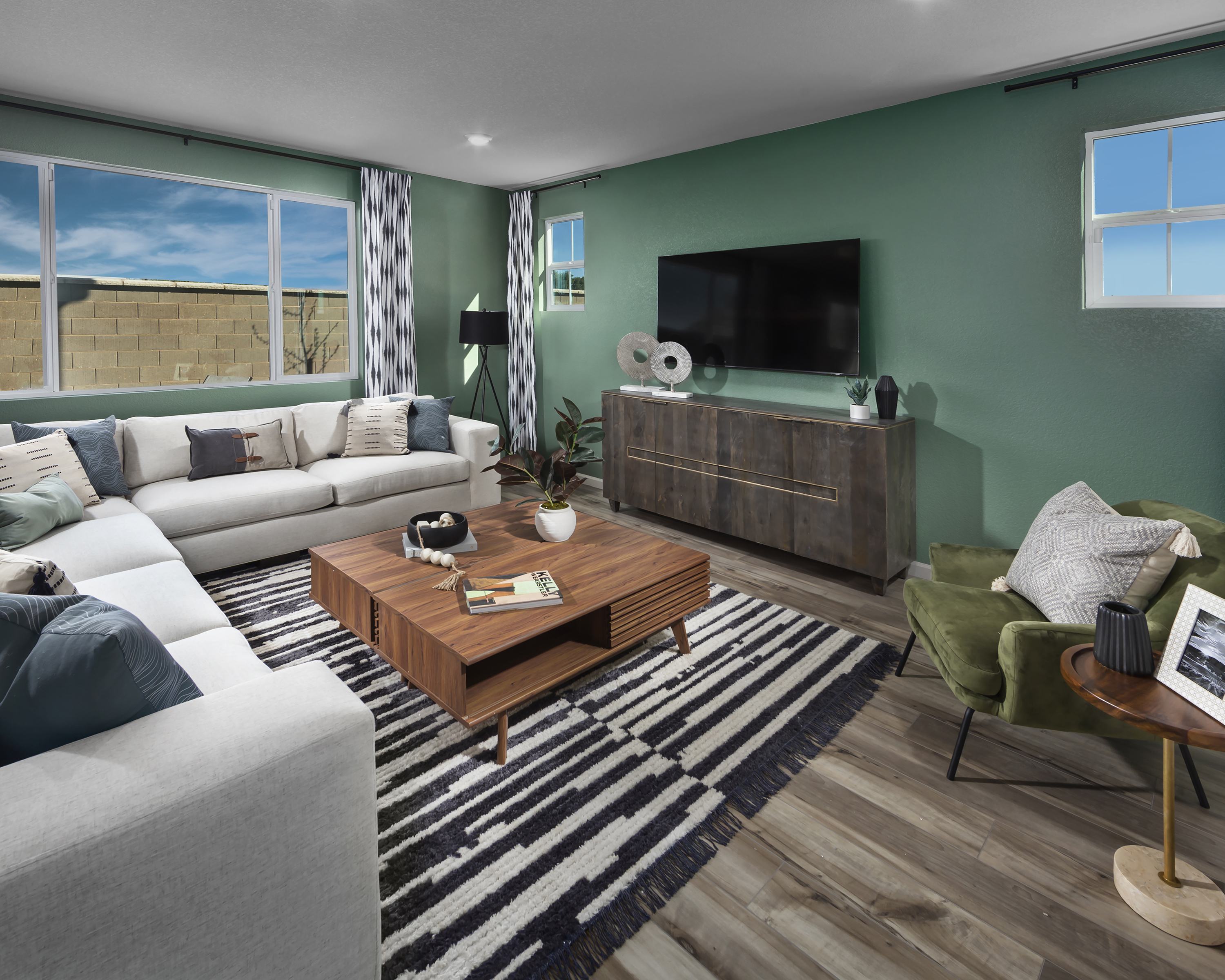 Residence 2 great room modeled at a nearby Meritage community.